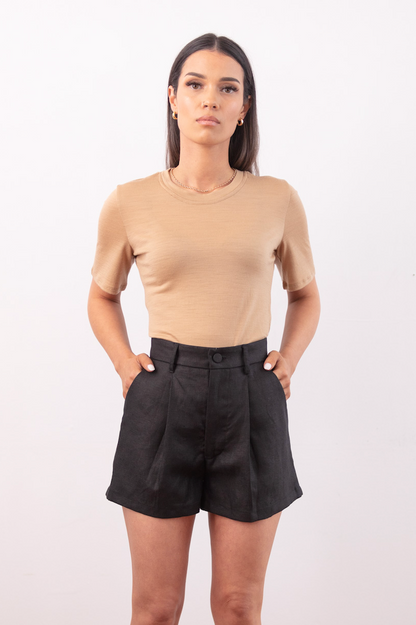 High-waisted Shorts, front pleats, structured waistband, bespoke button, quality heavy weight Linen. Colour Black.