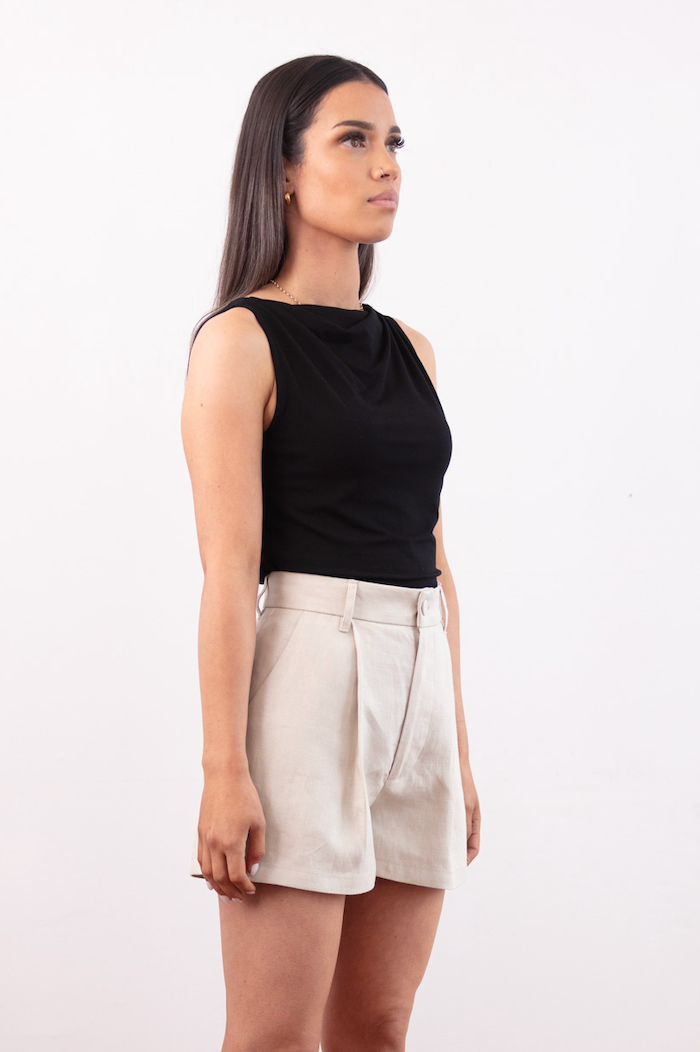 High-waisted Shorts, front pleats, structured waistband, bespoke button, quality heavy weight Linen. Colour Bone